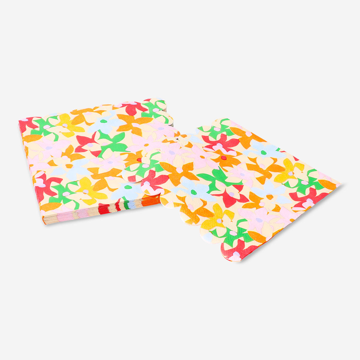Set of 16 floral and scalloped edge party napkins by Flying Tiger Copenhagen, featuring colorful floral patterns on white paper.