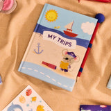 Kids' travel journal from Flying Tiger Copenhagen, featuring colorful pages and playful design for young travelers.