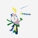 DIY tropical bird hobby kit by Flying Tiger Copenhagen, featuring a painted tropical bird figure for creative crafting.