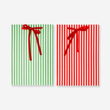 Two office gift bags with colorful striped design and ribbon handles, perfect for gift wrapping from Flying Tiger Copenhagen.