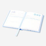 A6 office journal by Flying Tiger Copenhagen featuring a compact, stylish book with lined pages for writing and note-taking.