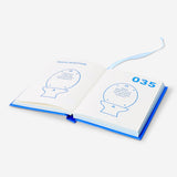 Flying Tiger Copenhagen Loo activity book for office use, featuring colorful illustrations and engaging activities for adults.
