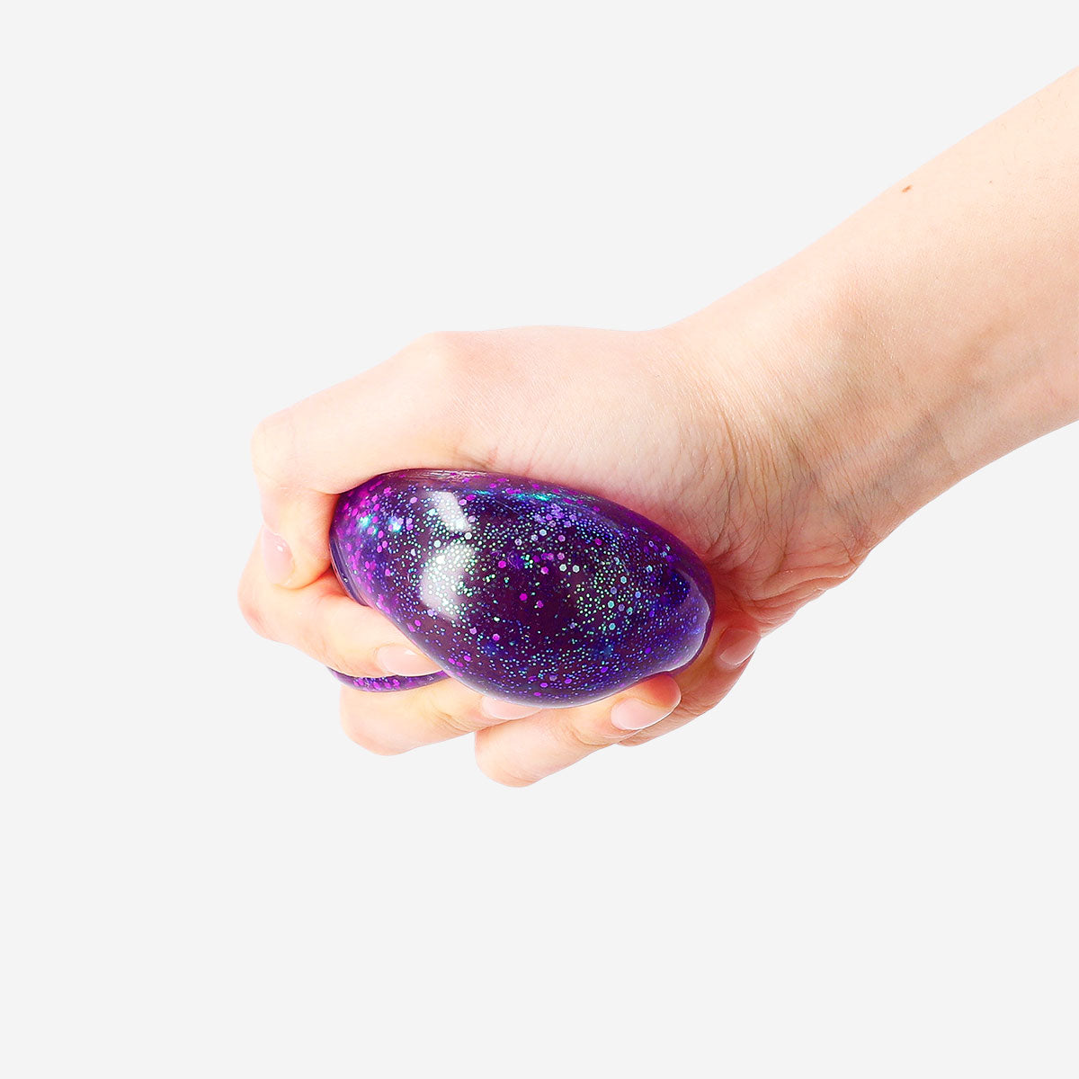 Purple glitter fidget ball gadget by Flying Tiger Copenhagen with a shiny, textured surface for stress relief and sensory fun.