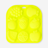 Flying Tiger Copenhagen ice cube tray with mixed fruit-shaped molds for fun, colorful frozen fruit ice cubes in a kitchen setting.