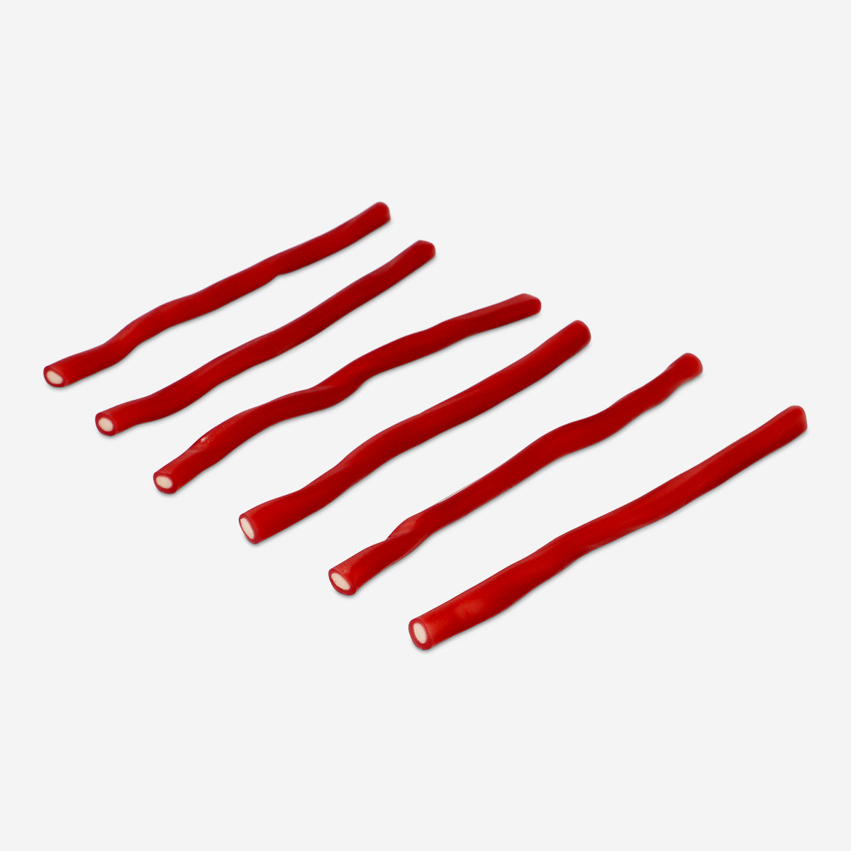 Strawberry-flavored gummy candy cables from Flying Tiger Copenhagen, colorful chewy sweets shaped like tangled cables.