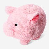 Plush piggy bank toy from Flying Tiger Copenhagen, soft pink pig with coin slot on back and cute facial features.
