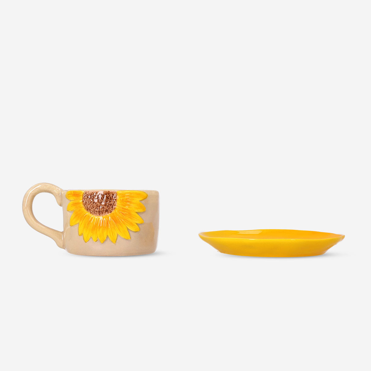 Flying Tiger Copenhagen 160ml mug with embossed sunflower design and matching saucer, perfect for kitchen decor and beverages.