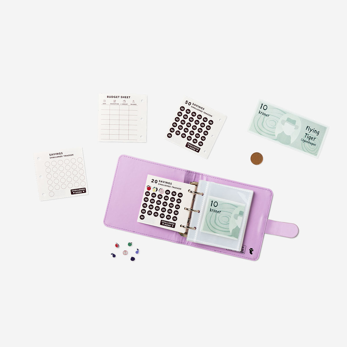 Flying Tiger Copenhagen money saving challenge booklet for office use, featuring colorful pages and savings tips.