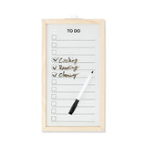 Wood-framed Flying Tiger Copenhagen office planner board with marker for organizing notes and schedules.