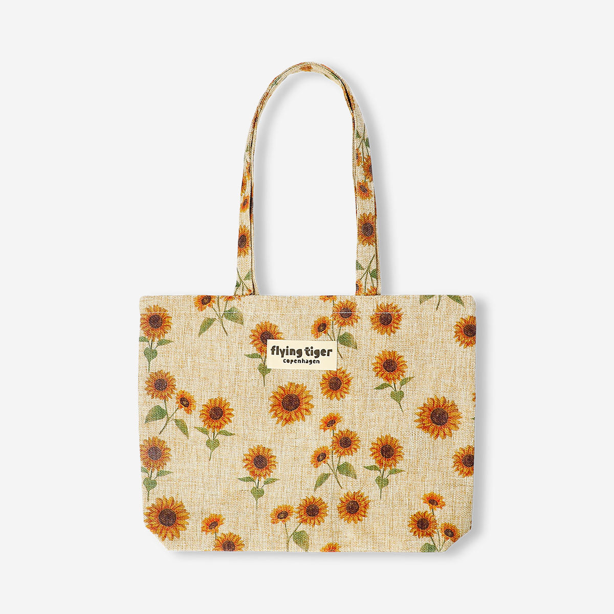 Flying Tiger Copenhagen sunflower print textile tote bag with sturdy handles and vibrant sunflower design.