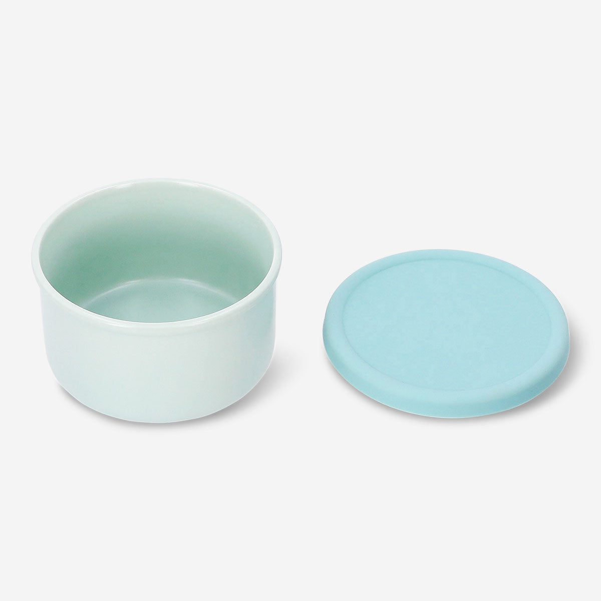 Green ceramic food container with silicone lid, 11 cm, from Flying Tiger Copenhagen, ideal for kitchen storage and food preservation.