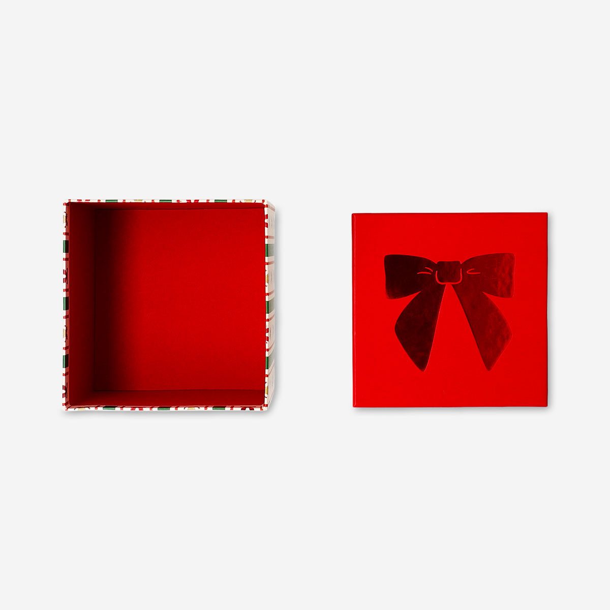 Office gift box with stripes and bows from Flying Tiger Copenhagen, measuring 14x14 cm, featuring colorful packaging design.