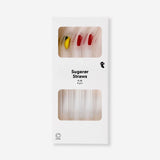 Set of four glass straws with fruit decorations from Flying Tiger Copenhagen, ideal for kitchen use and eco-friendly drinking.