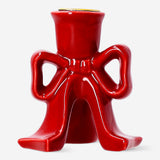 Red bow candle holder from Flying Tiger Copenhagen, 9 cm tall, with a decorative bow design for home decor.
