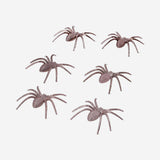 Six decorative metallic spiders for party decor, featuring shiny silver finish, perfect for Halloween or themed celebrations.