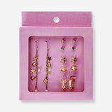Set of six textile earrings featuring sea icon designs from Flying Tiger Copenhagen, displayed on a neutral background.