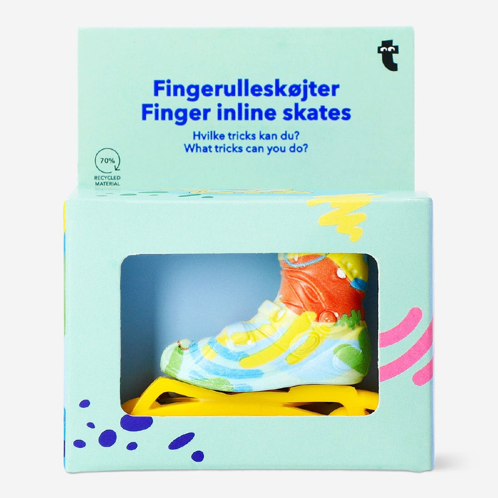 Toy finger inline skates from Flying Tiger Copenhagen, featuring small colorful wheels and adjustable straps for pretend play.