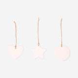 Set of three DIY ceramic ornaments for crafting hobby by Flying Tiger Copenhagen, featuring unpainted, blank ceramic surfaces.