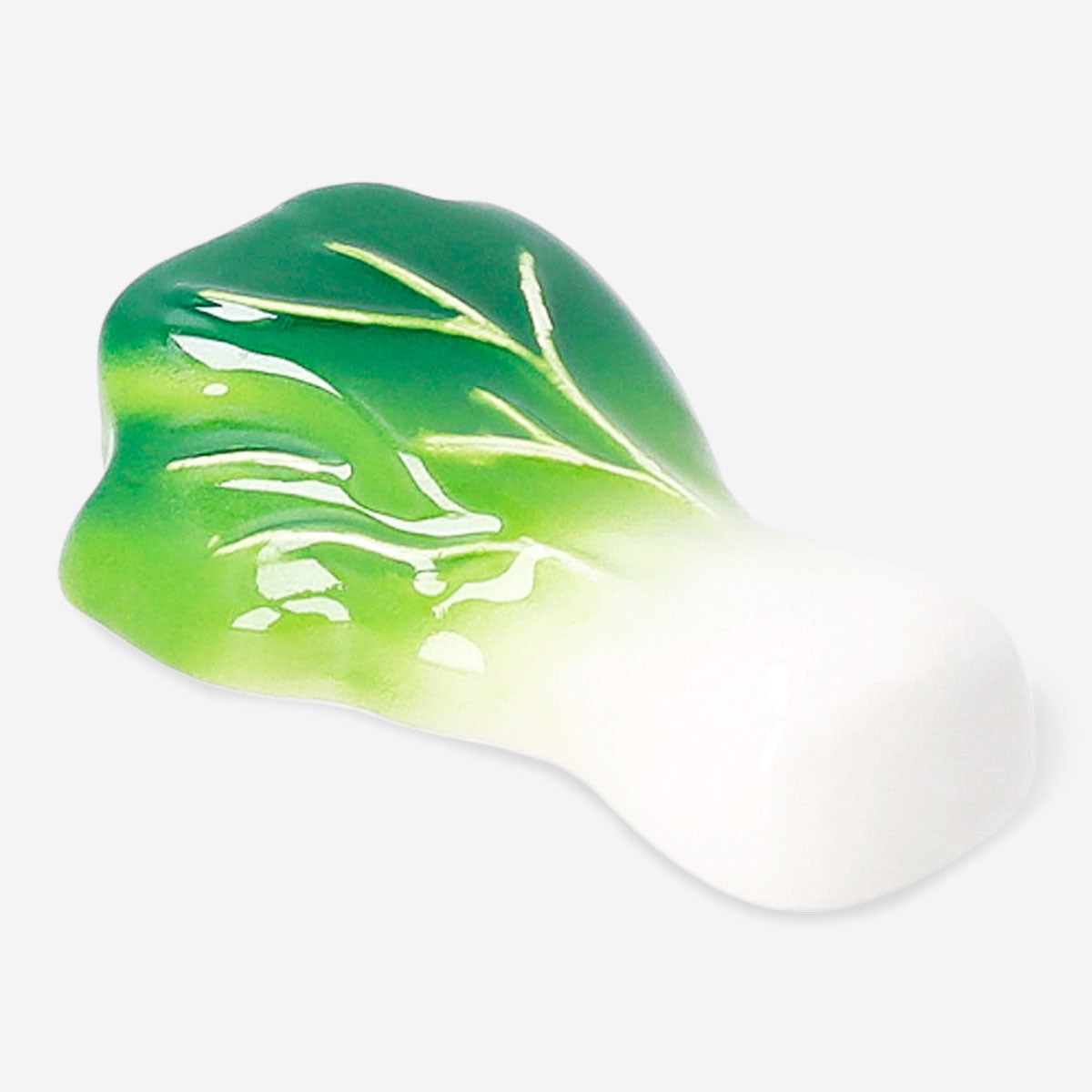 Flying Tiger Copenhagen Pak Choi chopstick holder, colorful kitchen accessory shaped like a leafy vegetable for organizing chopsticks.