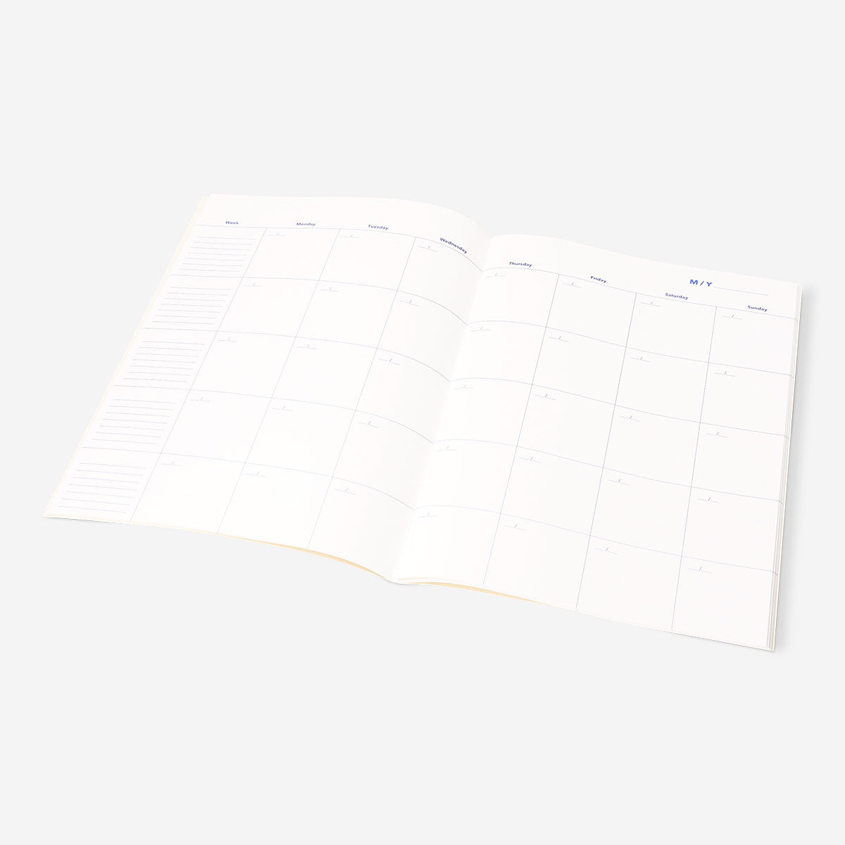 A4 floral monthly planner from Flying Tiger Copenhagen, open to show colorful floral pages and calendar layout.