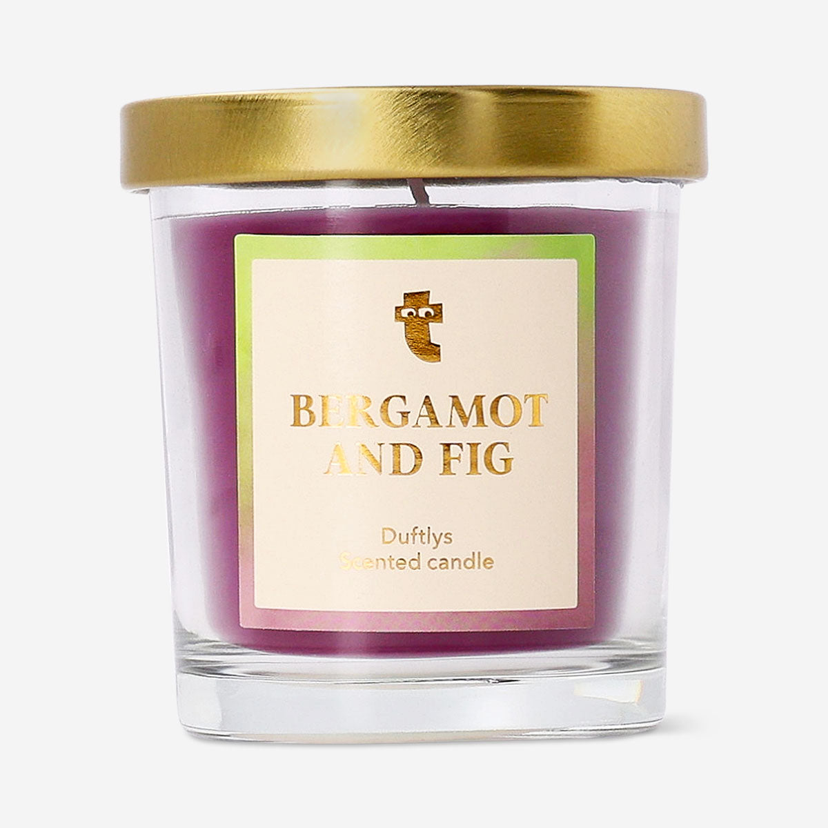 Flying Tiger Copenhagen scented candle with bergamot and fig fragrance, featuring a sleek glass jar and lit wick for home ambiance.