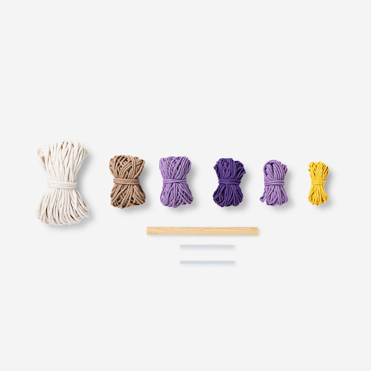 Flying Tiger Copenhagen floral macramé kit for hanging decor, featuring colorful cords and floral design for DIY hobby projects.