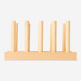 Wooden play plate rack set by Flying Tiger Copenhagen, featuring colorful toy plates on a wooden stand for children's play.