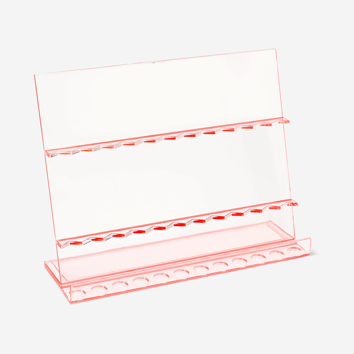 Clear cosmetic organizer for makeup brushes, 6x14x18 cm by Flying Tiger Copenhagen, showing multiple brush slots in a transparent design.