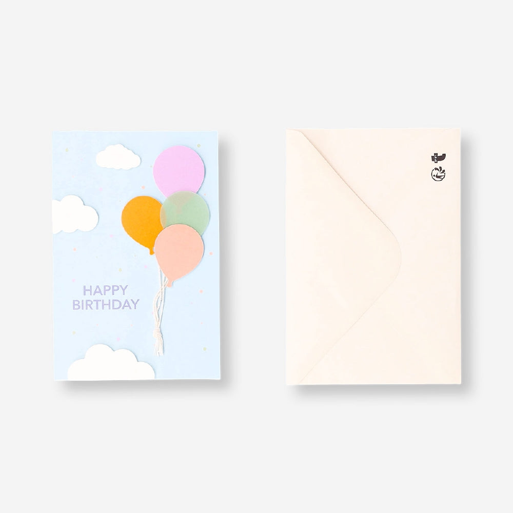 Colorful flying balloons birthday card from Flying Tiger Copenhagen, featuring vibrant balloon illustrations for celebrating occasions.