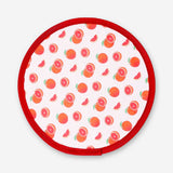 Foldable textile fan with blood orange print by Flying Tiger Copenhagen, showing the colorful, lightweight design and compact size.