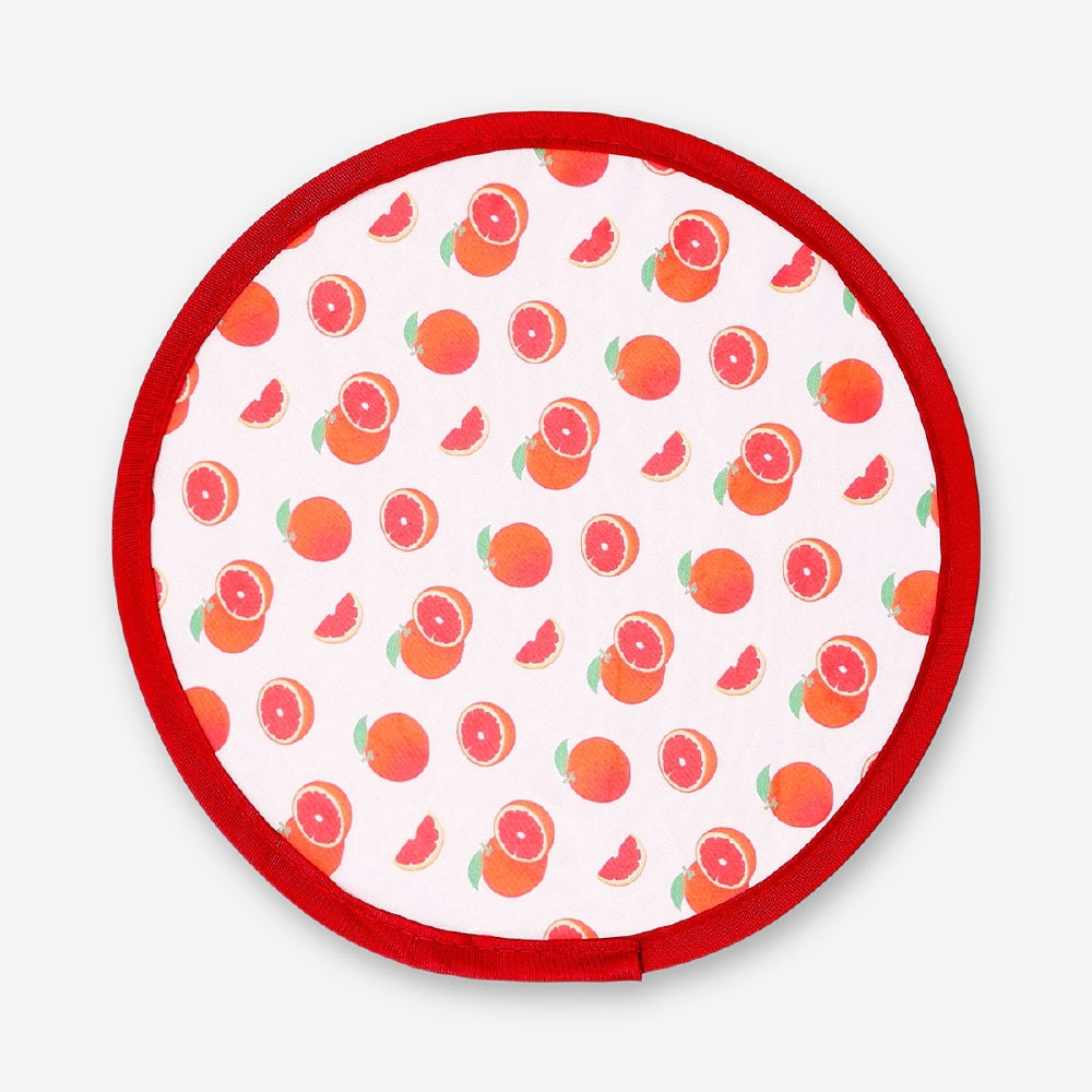 Foldable textile fan with blood orange print by Flying Tiger Copenhagen, showing the colorful, lightweight design and compact size.
