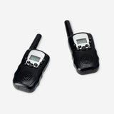 Pair of Flying Tiger Copenhagen walkie-talkies gadget in black with antennas, buttons, and speaker grills for communication.