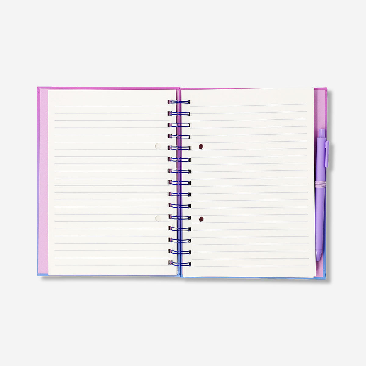 Gradient office notebook with Flying Tiger Copenhagen ballpoint pen and colorful page markers on open pages.