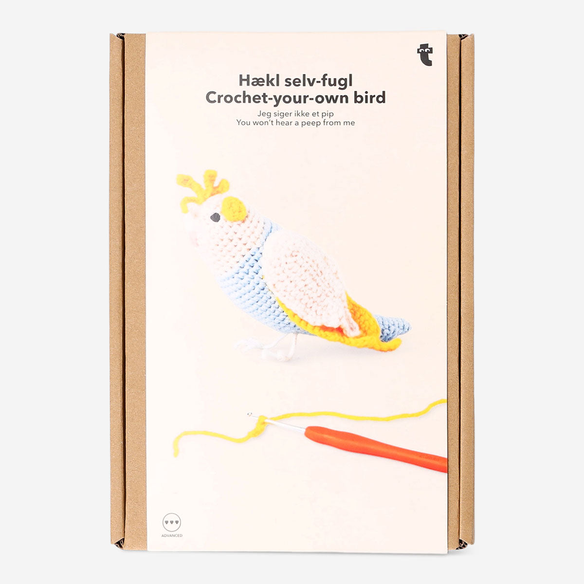 DIY crochet tropical bird hobby kit by Flying Tiger Copenhagen, featuring colorful crochet bird craft in progress.