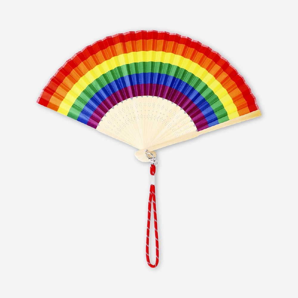 Foldable bamboo fan with rainbow print textile design by Flying Tiger Copenhagen, showcasing vibrant colors and compact portability.
