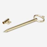 Flying Tiger Copenhagen ballpoint pen shaped like a key, office accessory with a sleek design and colorful details.