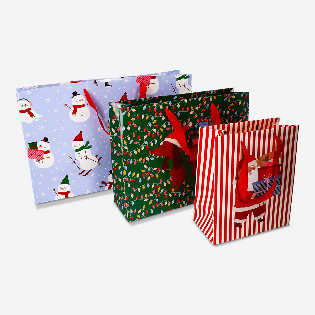 Set of three Flying Tiger Copenhagen Christmas print gift bags, ideal for holiday presents, featuring festive holiday designs.