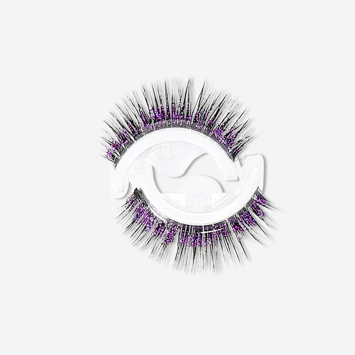 Purple adhesive eyelashes from Flying Tiger Copenhagen, perfect for personal care, with the lashes and adhesive visible on the image.