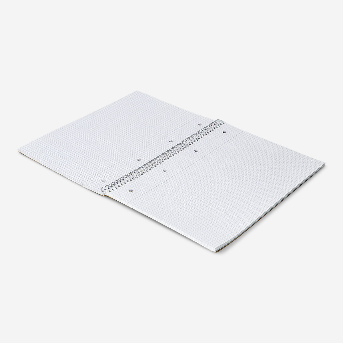 A4 spiral-bound grid notebook with a craft paper cover from Flying Tiger Copenhagen, shown open with visible grid pages inside.