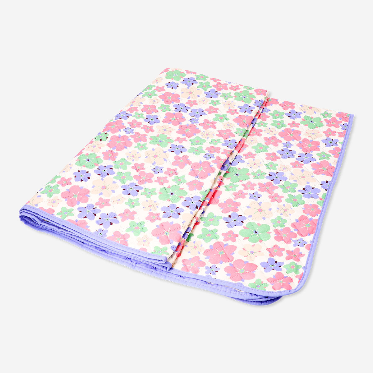 Quilted floral blanket from Flying Tiger Copenhagen, 170x130 cm, soft fabric with colorful floral pattern for home decor.