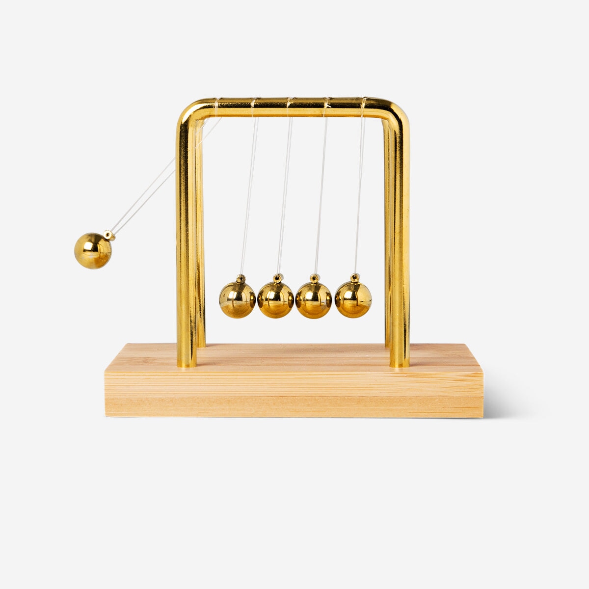 Brass coloured newton's cradle Gadget Flying Tiger Copenhagen 