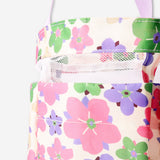 Floral hanging bathroom organizer by Flying Tiger Copenhagen with multiple pockets for bathroom essentials.