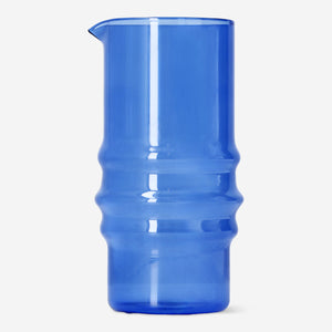 Blue glass jug from Flying Tiger Copenhagen Designer Collection, 800 ml capacity, ideal for kitchen serving or decorative use.