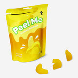 Flying Tiger Copenhagen Peelers Candy Banana flavor, bright yellow banana-shaped chewy candy on a white background.