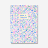 A4 floral monthly planner from Flying Tiger Copenhagen with colorful floral cover, ideal for organizing monthly schedules.