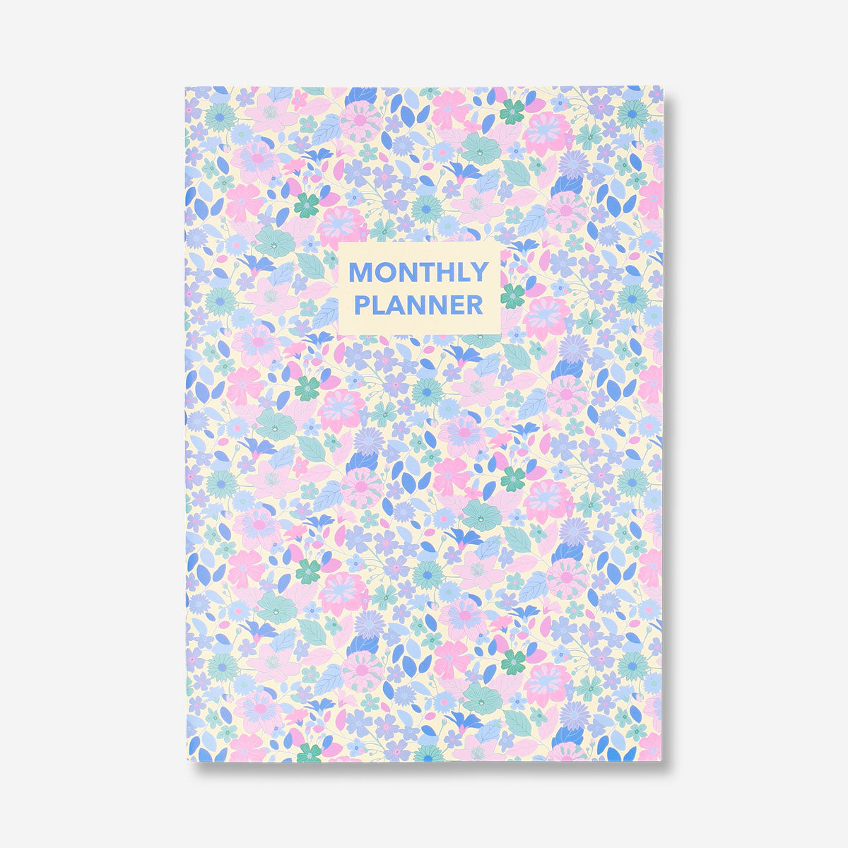 A4 floral monthly planner from Flying Tiger Copenhagen with colorful floral cover, ideal for organizing monthly schedules.