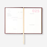 A6 project planner in English from Flying Tiger Copenhagen, featuring an open planner with organized pages for office use.