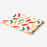 Tablecloth with chili print from Flying Tiger Copenhagen, measuring 140x220 cm, featuring a vibrant chili pattern on fabric.
