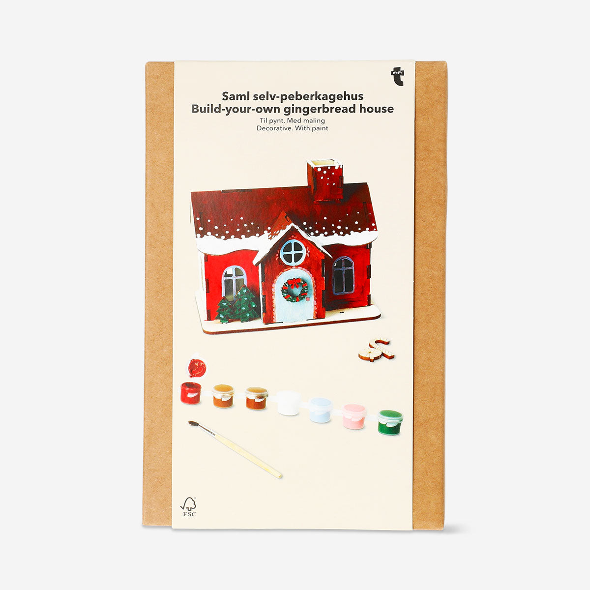DIY wooden gingerbread house hobby kit by Flying Tiger Copenhagen featuring assembled wooden pieces for creative craft projects.