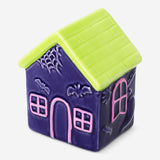 Decorative ceramic Halloween house by Flying Tiger Copenhagen, 10 cm tall, with spooky design and detailed Halloween-themed features.
